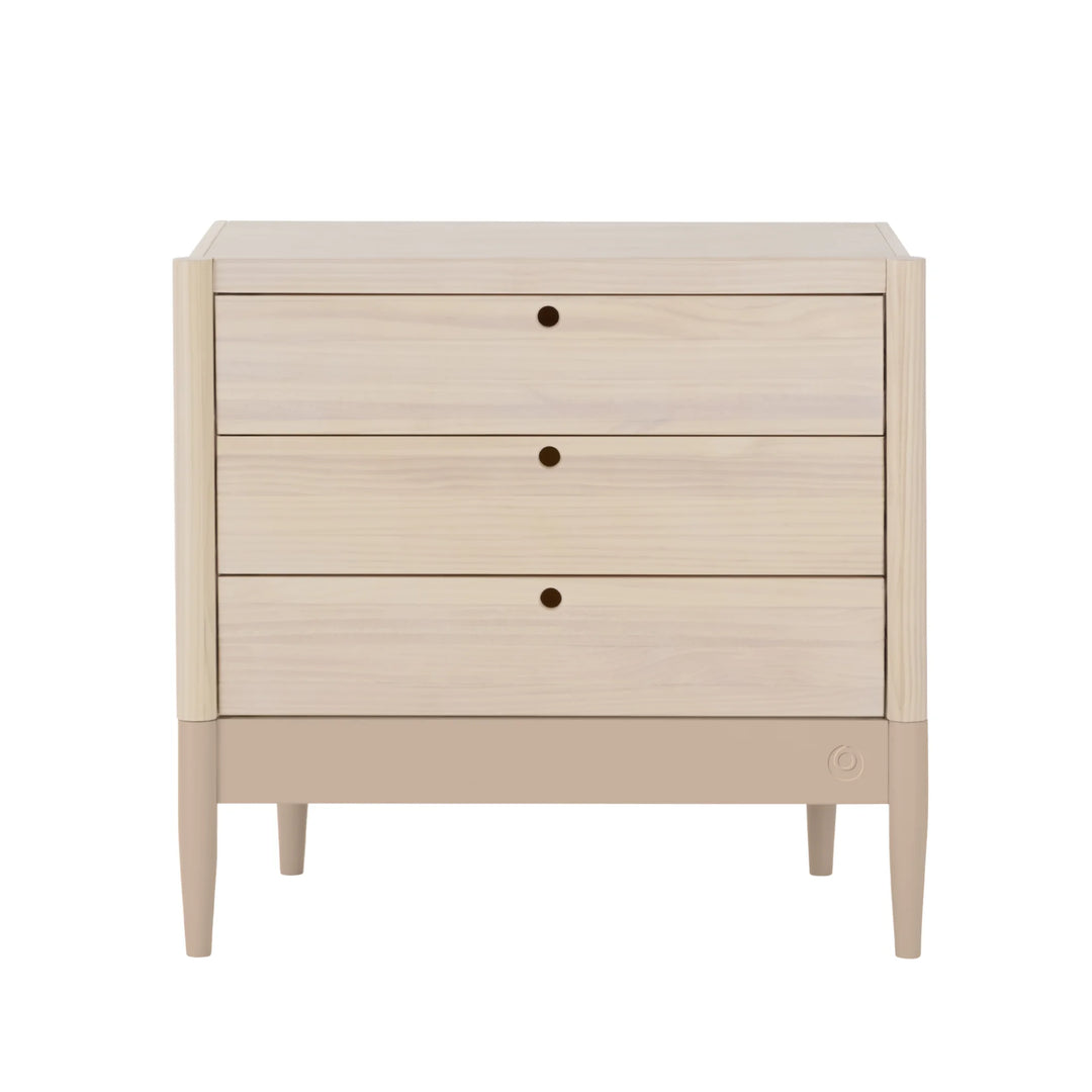 Gaia Baby Eos dresser in natural wood and powder blush on a white background