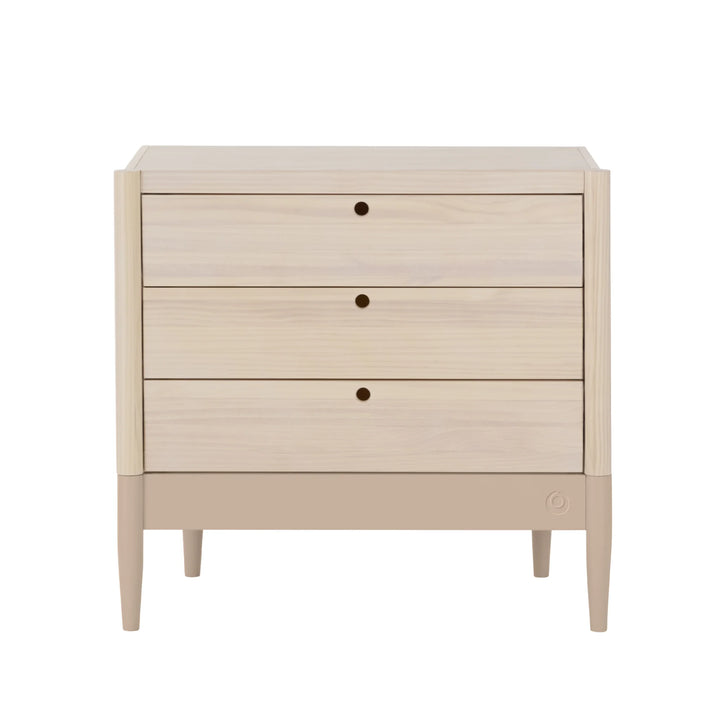 Gaia Baby Eos dresser in natural wood and powder blush on a white background