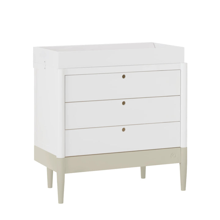 Gaia Baby Eos dresser with changer in white and desert sage base angled view on white background