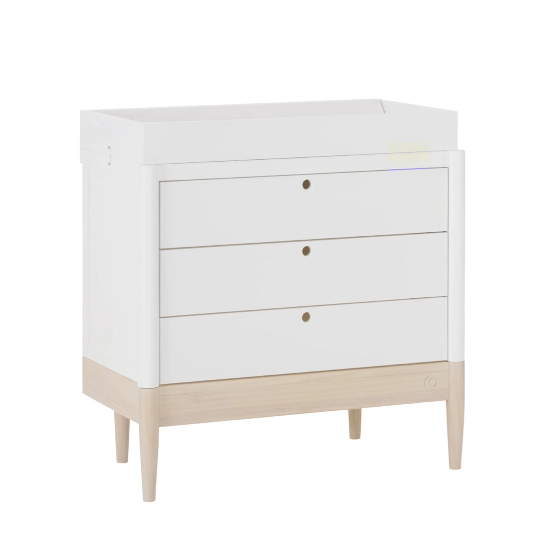 Gaia Baby Eos dresser in white and natural wood with changing top on a white background