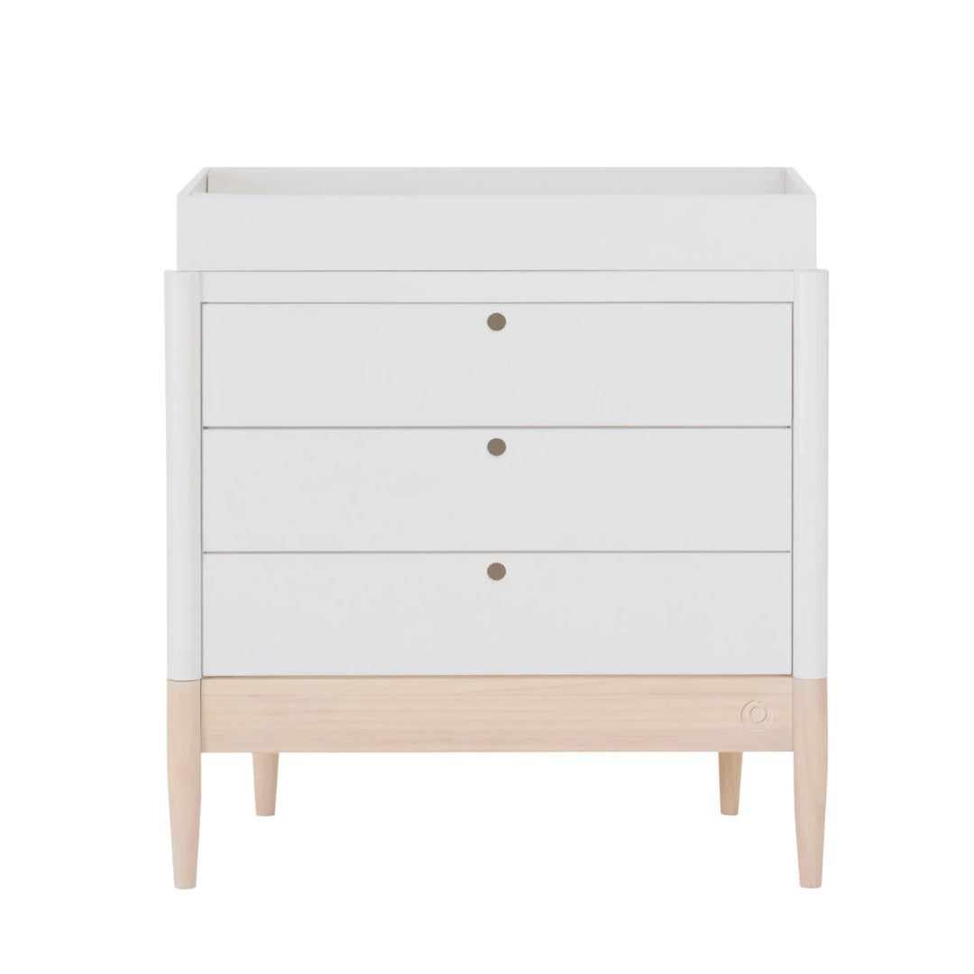 Gaia Baby Eos dresser in white and natural wood with changing top on a white background