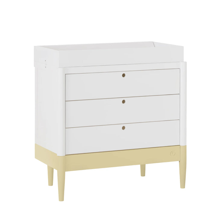 Gaia Baby Eos white dresser with three drawers and yellow base, modern nursery storage unit