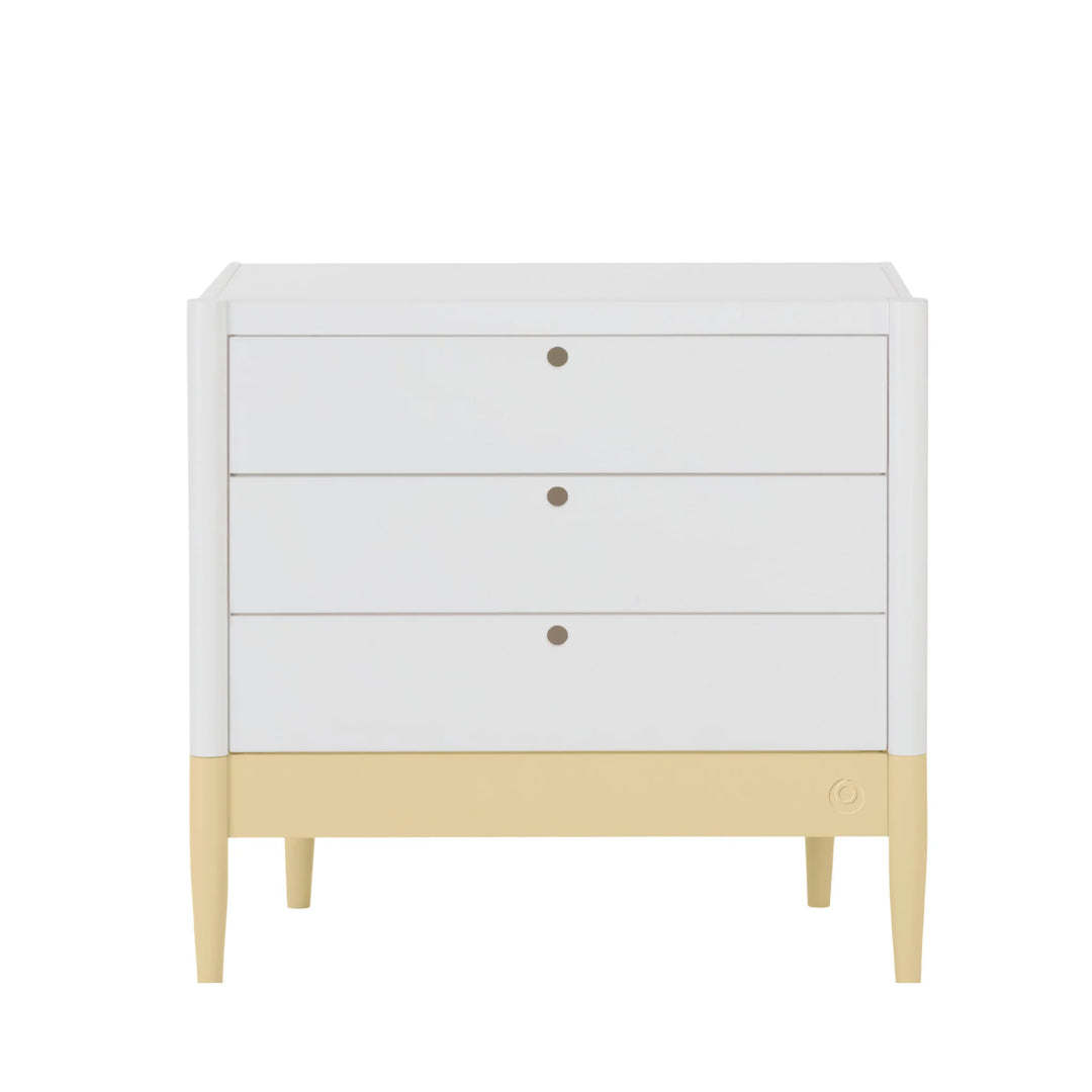 Gaia Baby Eos white dresser with three drawers and yellow base, modern nursery storage unit