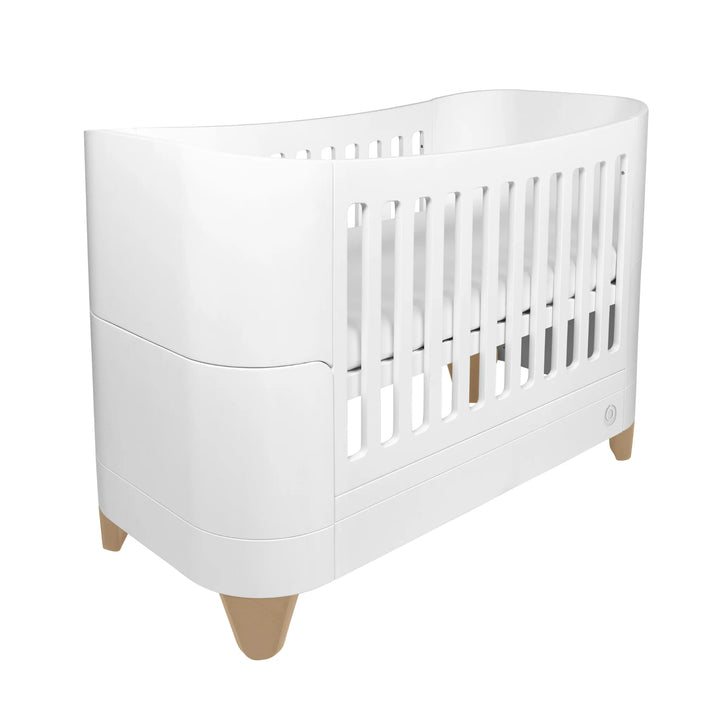 Serena Cot Bed on white background angled.