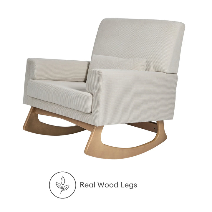 Angled view of the Gaia Baby Serena Rocking Nursing Chair in soft ecru corduroy fabric with natural real wood rocking legs, highlighting the chair’s premium craftsmanship, smooth rocking motion, and timeless nursery design.