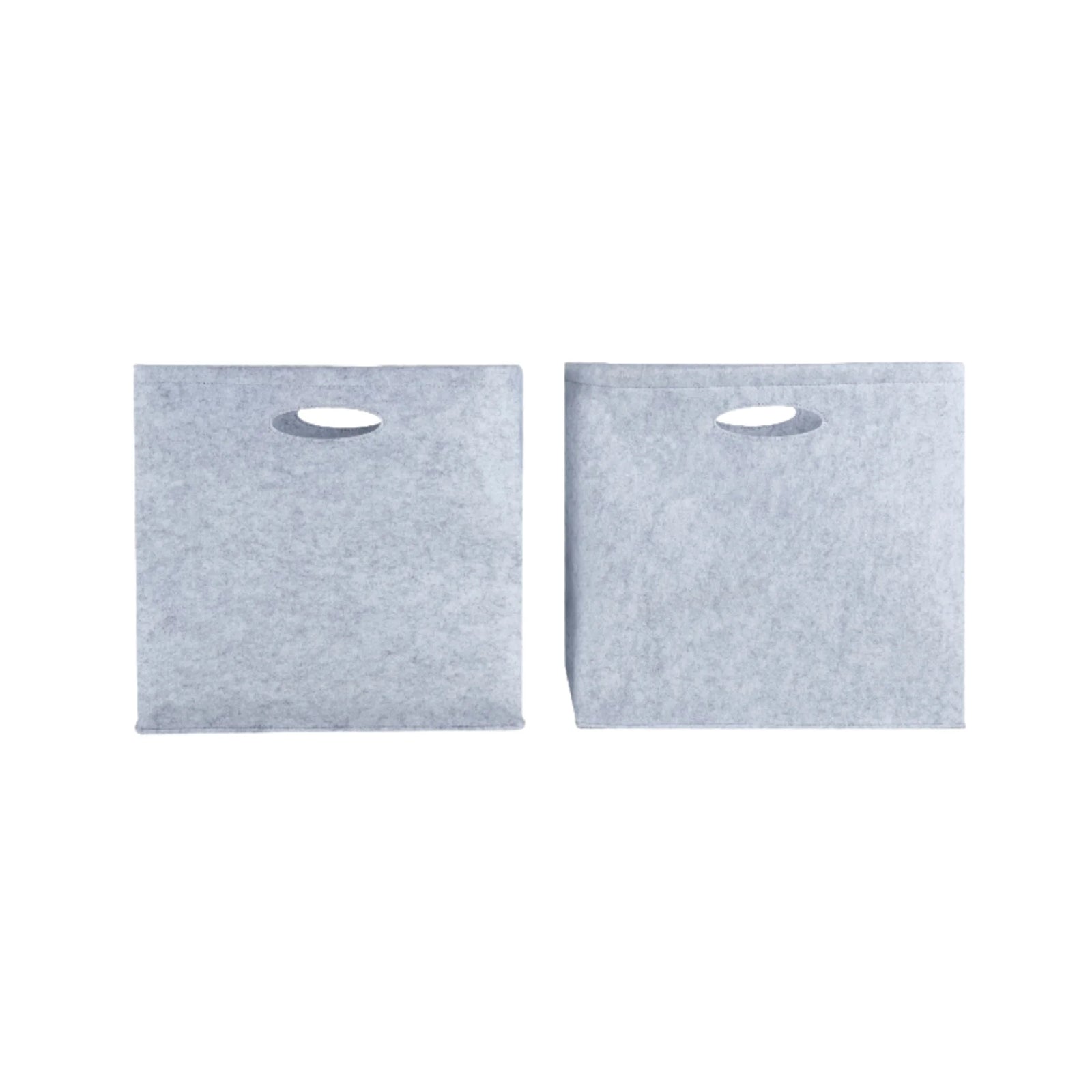 Set of two Gaia Baby Hera Bedside Crib felt storage boxes in soft grey, featuring cut-out carry handles and durable eco-friendly construction, designed to fit perfectly inside the Hera crib storage conversion for organised nursery essentials.