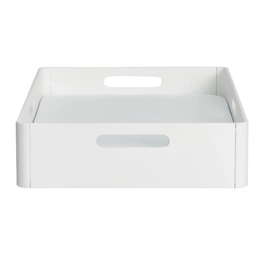 Gaia Baby Hera changing station in white, modern wooden nursery changing tray with integrated handles designed to sit securely on dressers for safe baby changing.