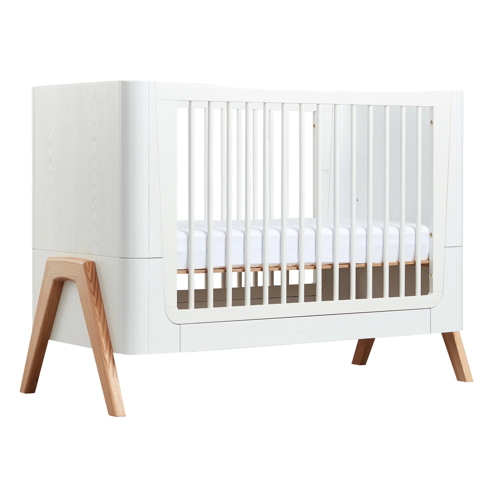 Gaia Baby Hera cot bed in Scandi White and natural wood, angled view showing curved Scandinavian design, white slatted sides, natural A-frame legs and premium sustainable convertible nursery construction.