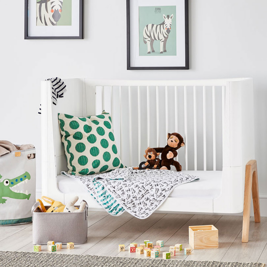 Gaia Baby Lifestyle image of the Hera Cot Bed in Scandi White and Natural as the Toddler Bed