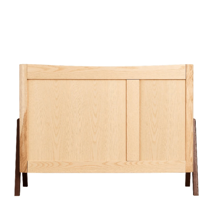 “Back view of the Gaia Baby Hera dresser in Scandi white with natural ash and walnut accents, showcasing solid wood panel construction and Scandinavian minimalist design.”