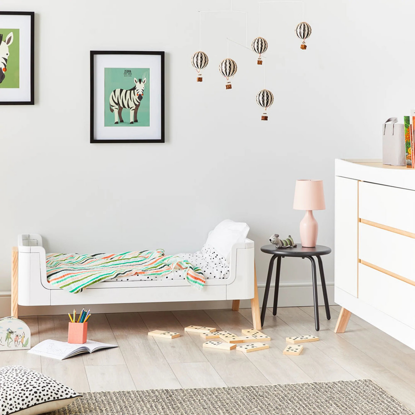 Lifestyle image of the Hera Cot Bed FIrst Bed