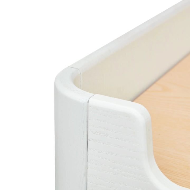 “Close-up of the Gaia Baby Hera wardrobe in Scandi white showing smooth rounded corner detailing and natural wood interior, highlighting premium craftsmanship and safety-focused design.”