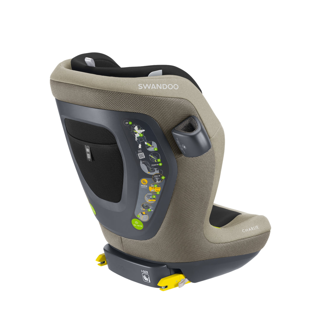 Angled view of Swandoo Charlie i-Size child booster seat in Blissful Beige featuring ergonomic design and ISOFIX installation.