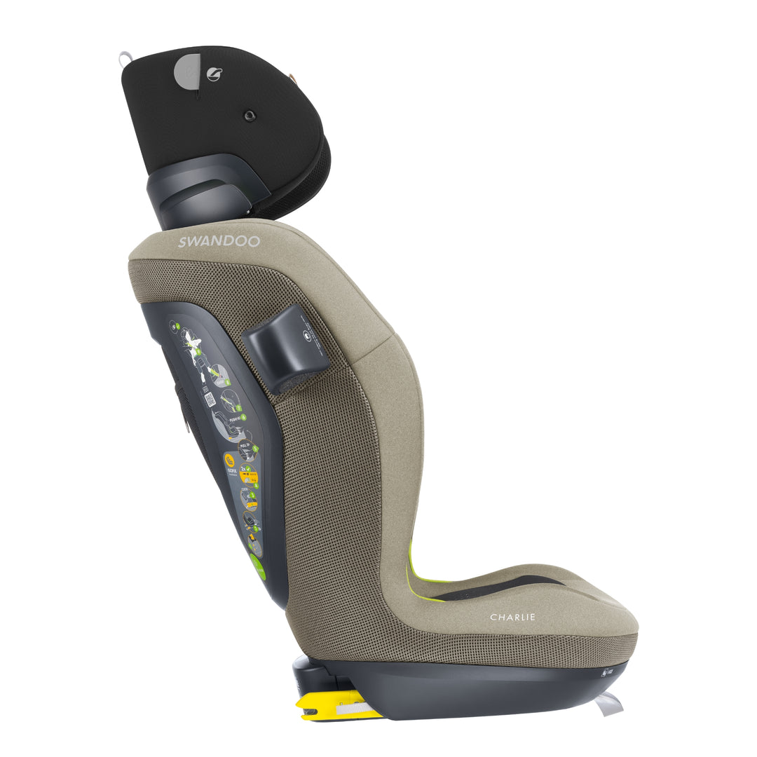 Side profile of Swandoo Charlie i-Size child booster seat with extended adjustable headrest in Blissful Beige and black.