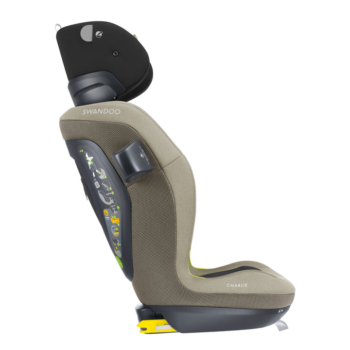 Side profile of Swandoo Charlie i-Size child booster seat with extended adjustable headrest in Blissful Beige and black.