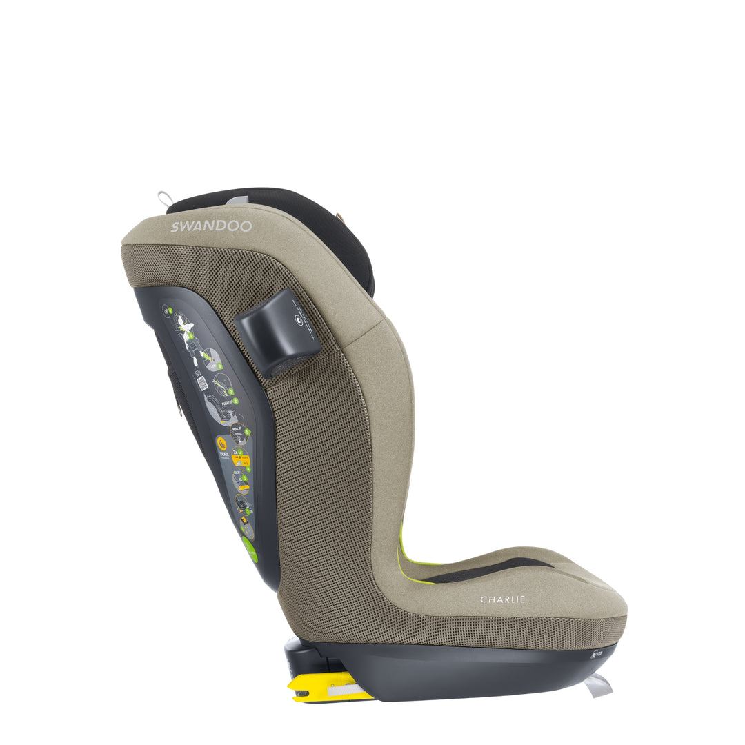 Side profile of Swandoo Charlie i-Size child booster seat in Blissful Beige featuring integrated ISOFIX safety technology.