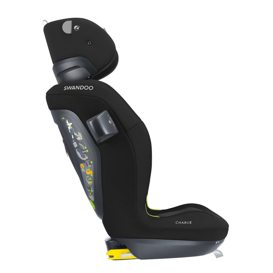 Side profile of Swandoo Charlie i-Size child booster seat with extended adjustable headrest in Bold Black and ergonomic safety design.