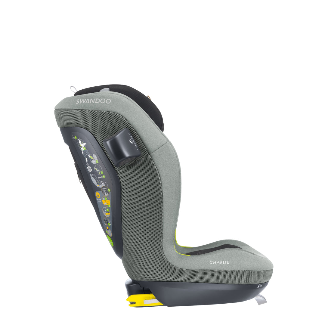 Side profile of Swandoo Charlie i-Size child booster seat in Groovy Green with integrated ISOFIX safety system.