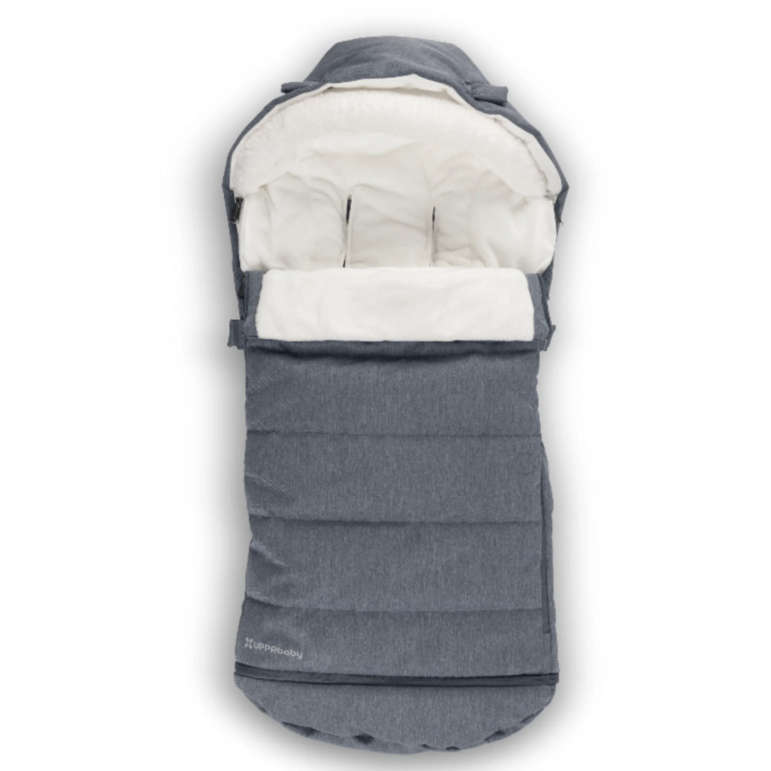 UPPAbaby 2-in-1 Seasonal Cozy Ganoosh footmuff in Julian blue, featuring plush fleece lining, zip-out liner and insulated, windproof design for keeping babies warm in cold weather in UPPAbaby strollers.