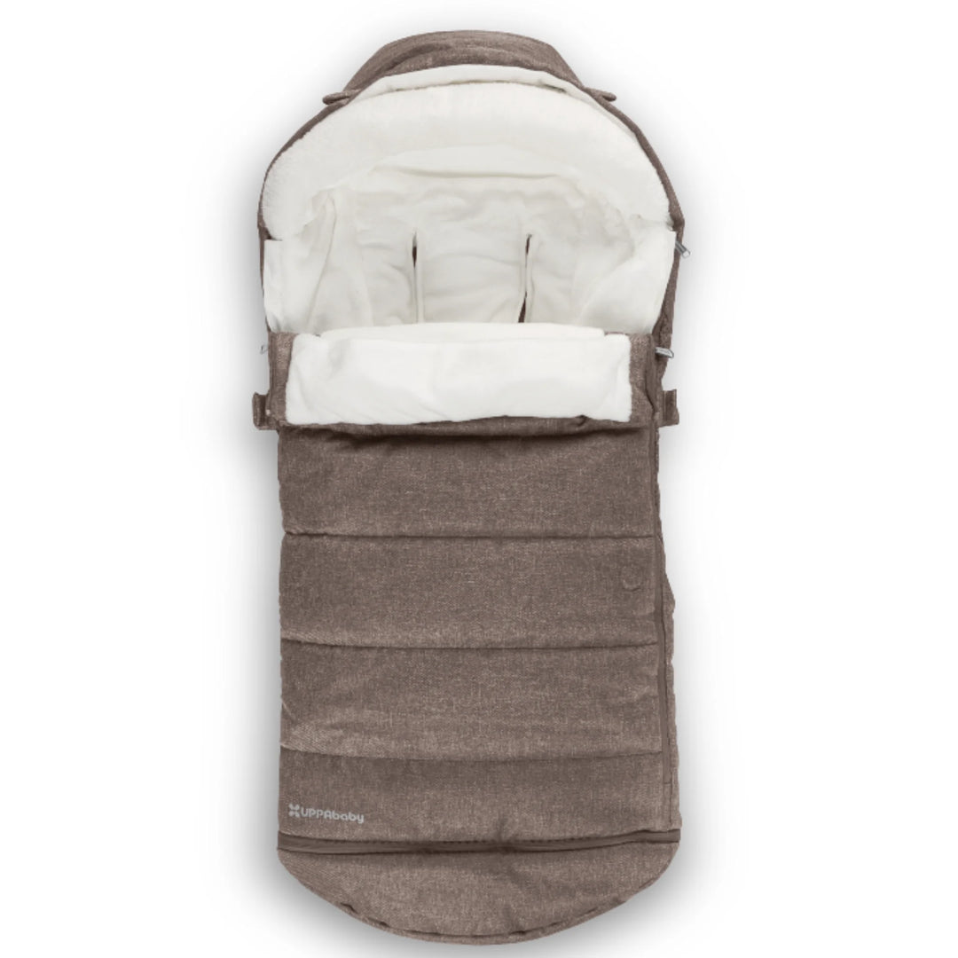 UPPAbaby 2-in-1 Seasonal Cozy Ganoosh footmuff in Owen brown, plush fleece-lined stroller footmuff with zip-out liner, windproof and water-repellent fabric, designed for all-season comfort and compatibility with UPPAbaby pushchairs.