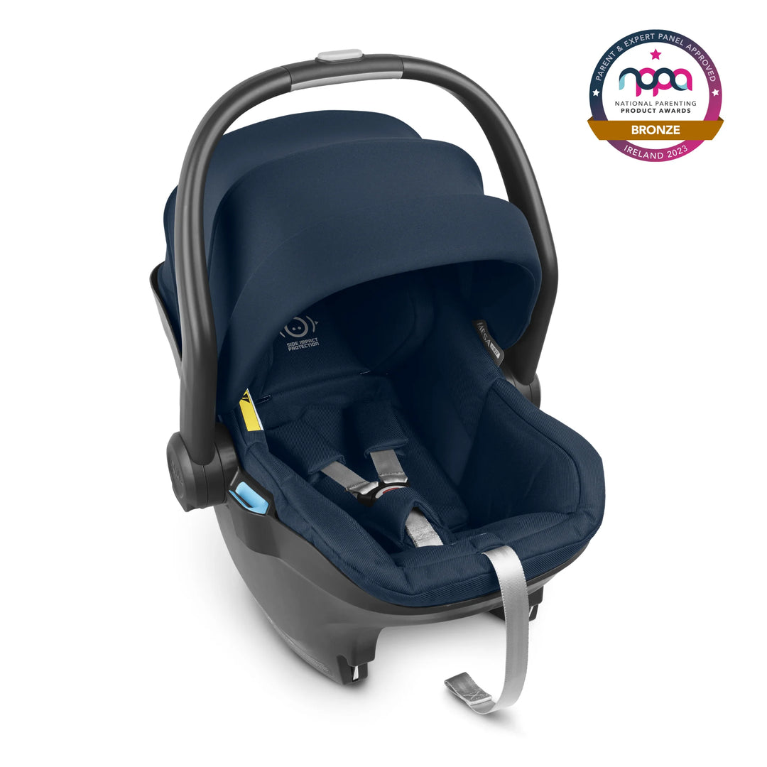 UPPAbaby Mesa iSize infant car seat with kid friendly fabrics and a UPF 25+ extendable canopy in Noa. The NPPA bronze 2023 logo is in the top right hand corner