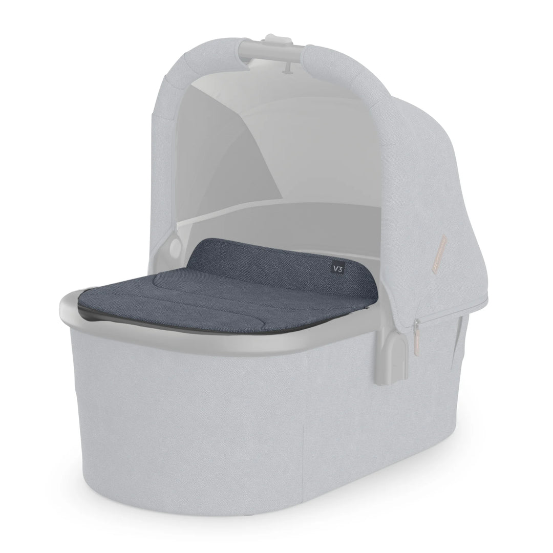 UPPAbaby Bassinet V3 in light grey with Julian blue boot cover, shown on a white background