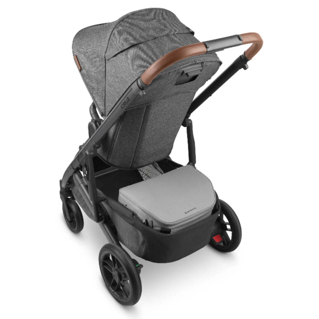 UPPAbaby Bevvy stroller basket cooler box fitted inside UPPAbaby pushchair basket, insulated cooler accessory for carrying drinks and snacks while strolling.