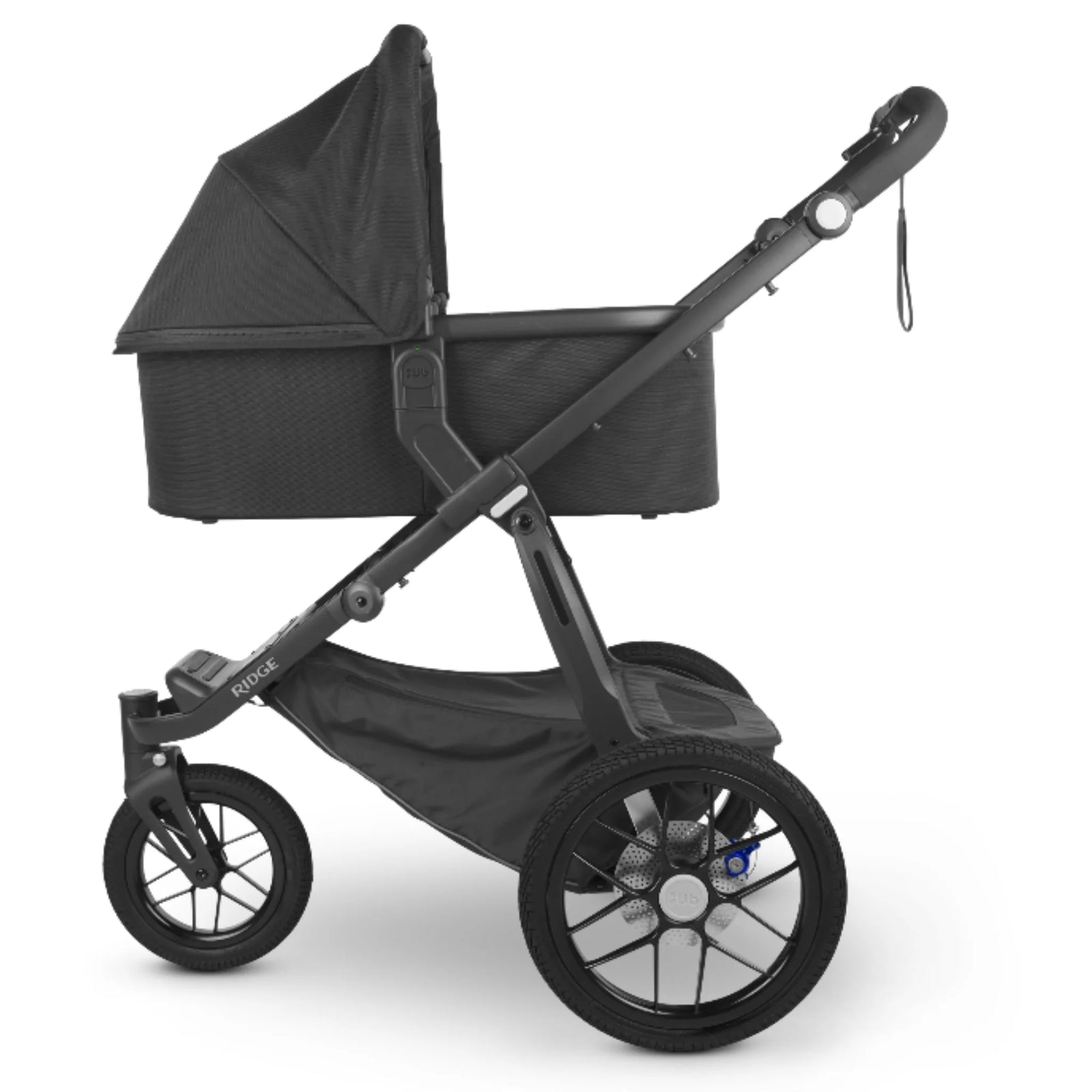 UPPAbaby Carrycot V2 in Jake black shown attached to UPPAbaby pushchair frame, newborn bassinet compatible with Vista and Cruz strollers.