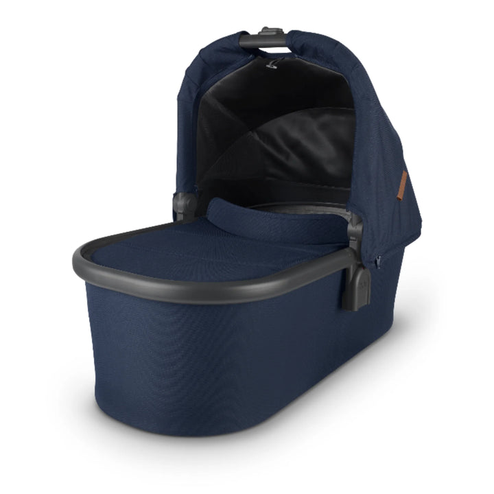 UPPAbaby Carrycot V2 in Noa navy, newborn bassinet with ventilated canopy and breathable mattress, compatible with UPPAbaby Vista and Cruz pushchairs.