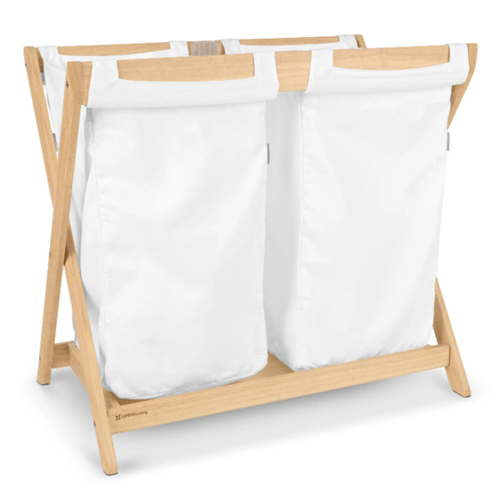 UPPAbaby Carrycot Stand Hamper Insert in natural wood with dual white fabric laundry bags, designed to convert the UPPAbaby Carrycot Stand into a stylish nursery hamper for organising baby clothes.