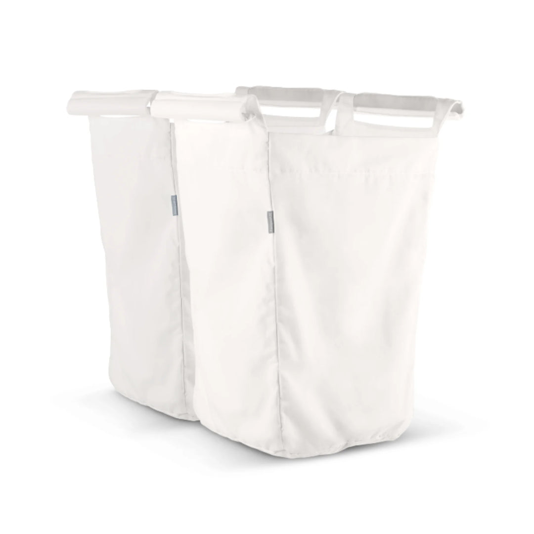 UPPAbaby Carrycot Stand Laundry Hamper Inserts, set of two white removable fabric bags designed to attach to the UPPAbaby Carrycot Stand for convenient nursery laundry storage.