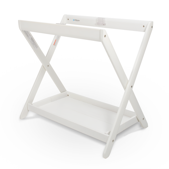 Product shot of the UPPAbaby carrycot stand in white with no carry cot attached