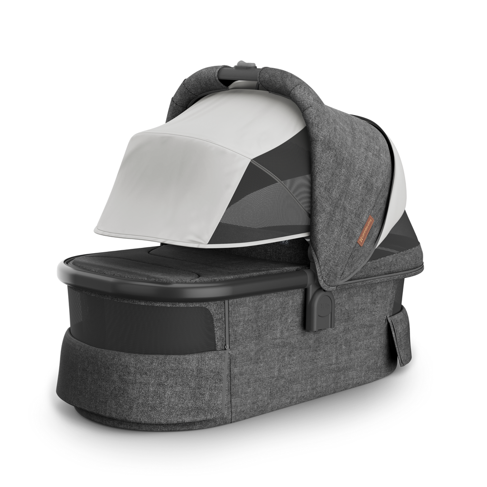 This image shows the Carrycot V3 in Greyson with the Sunshade down and all vents open for maximum visibility.