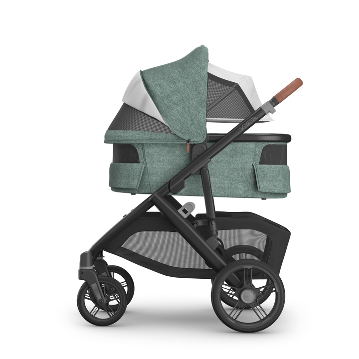 This image shows the Carrycot V3 in Gwen with the sunshade and all vents down on the Vista V3 chassis.