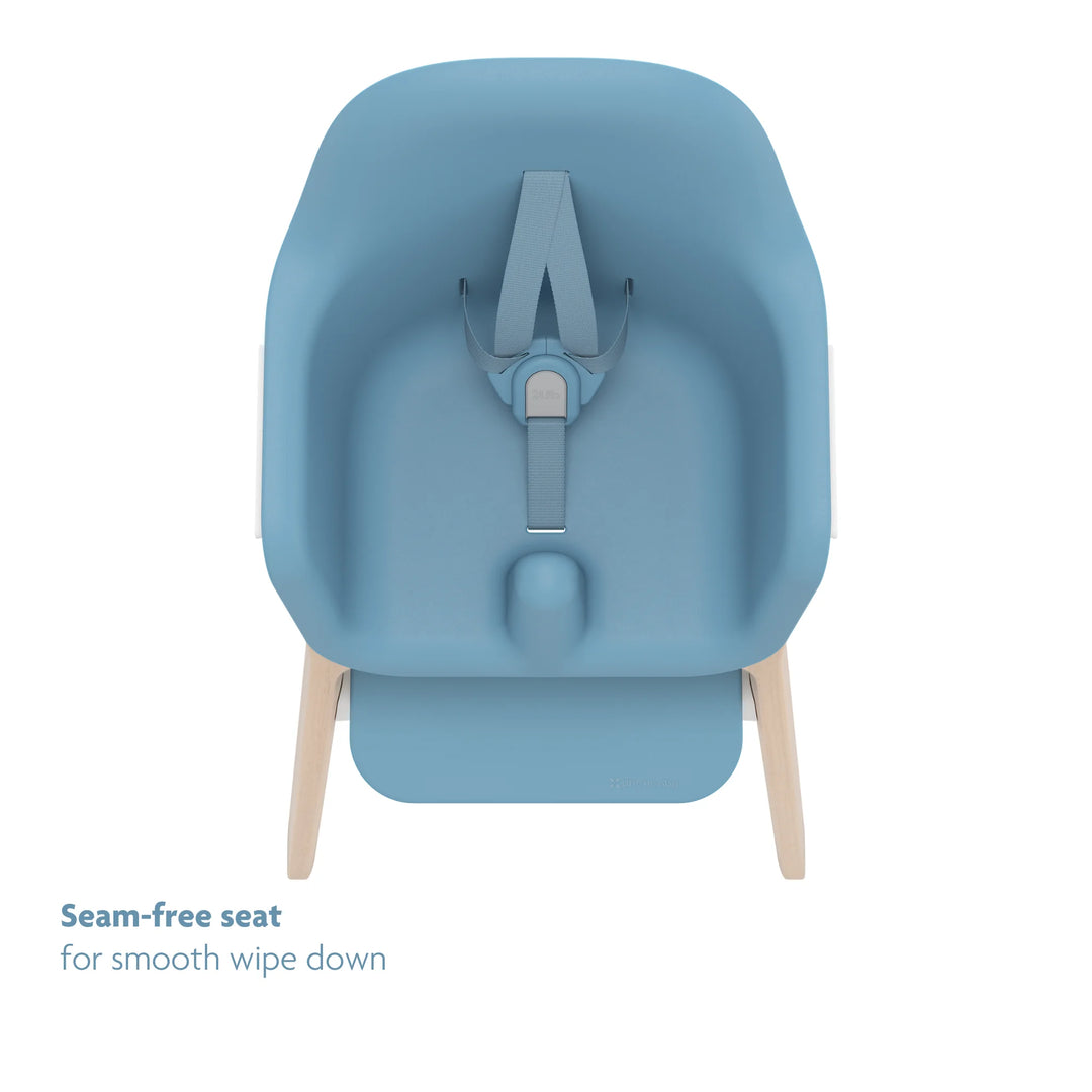 Blue high chair top down view of seamless seat and no-rethread adjustable harness on white background.