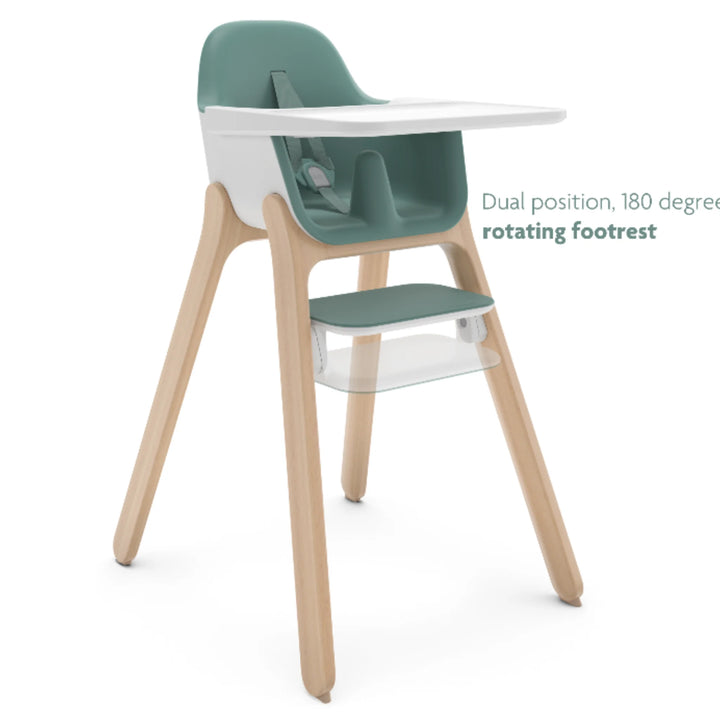 UPPAbaby Ciro High Chair Emrick in green with wooden legs, featuring a dual-position 180-degree rotating footrest, modern ergonomic baby high chair design.