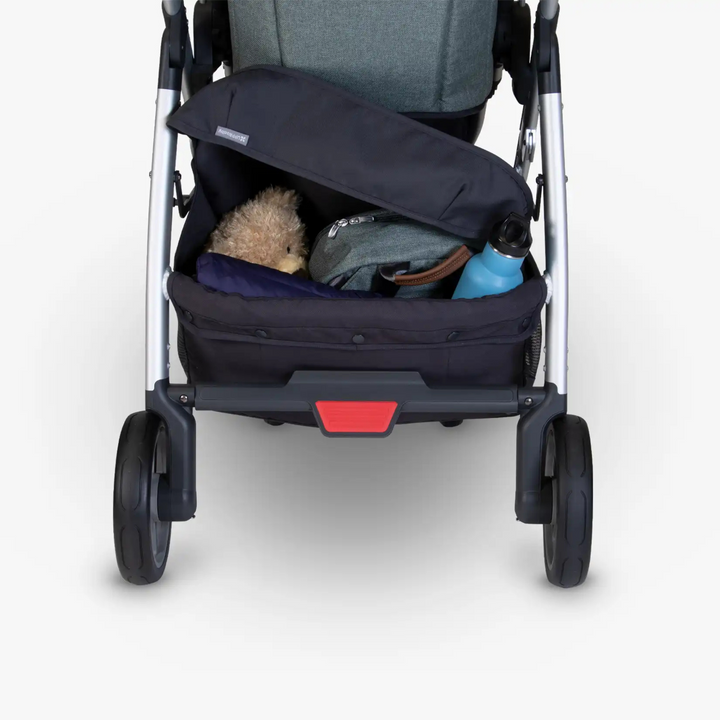 This image highlights the Cruz 2015-2019 basket cover on the stroller