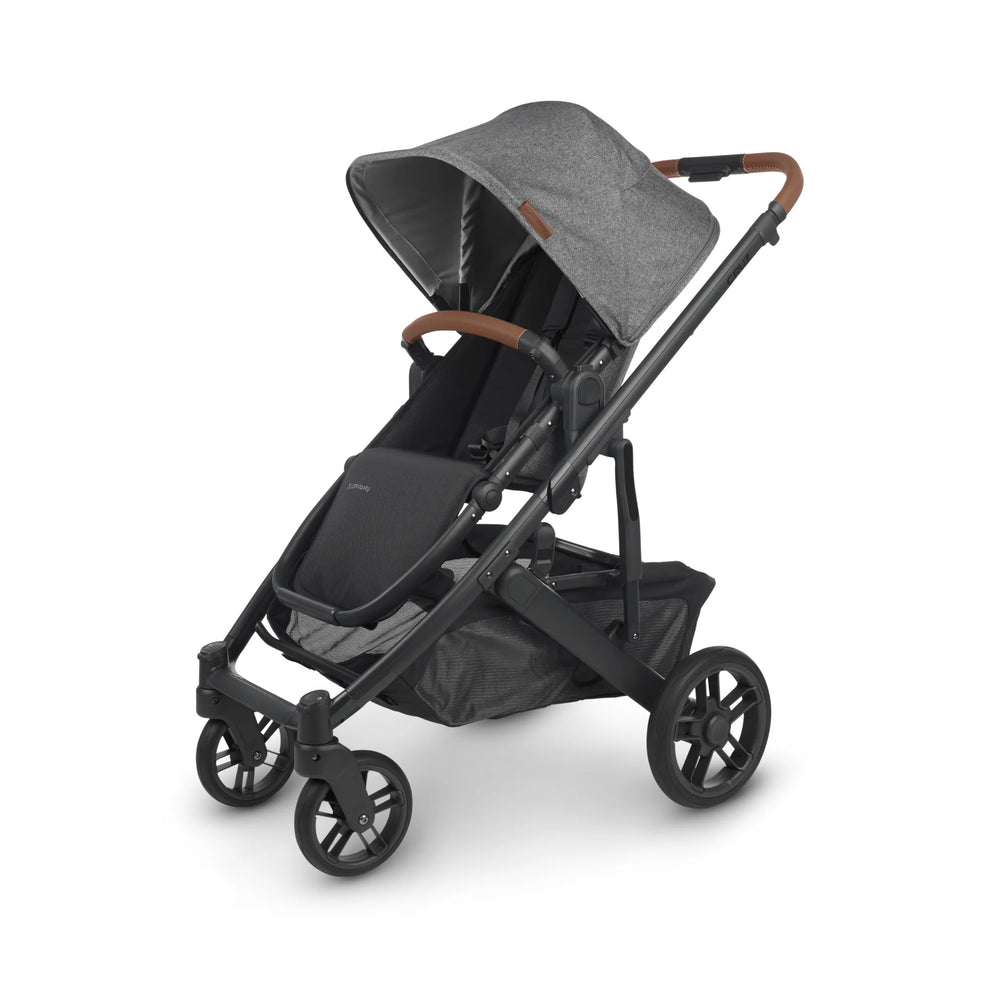 UPPAbaby Cruz V2 Greyson lightweight baby stroller with leather accents, reversible toddler seat, and large storage basket – modern grey pushchair ideal for urban families.