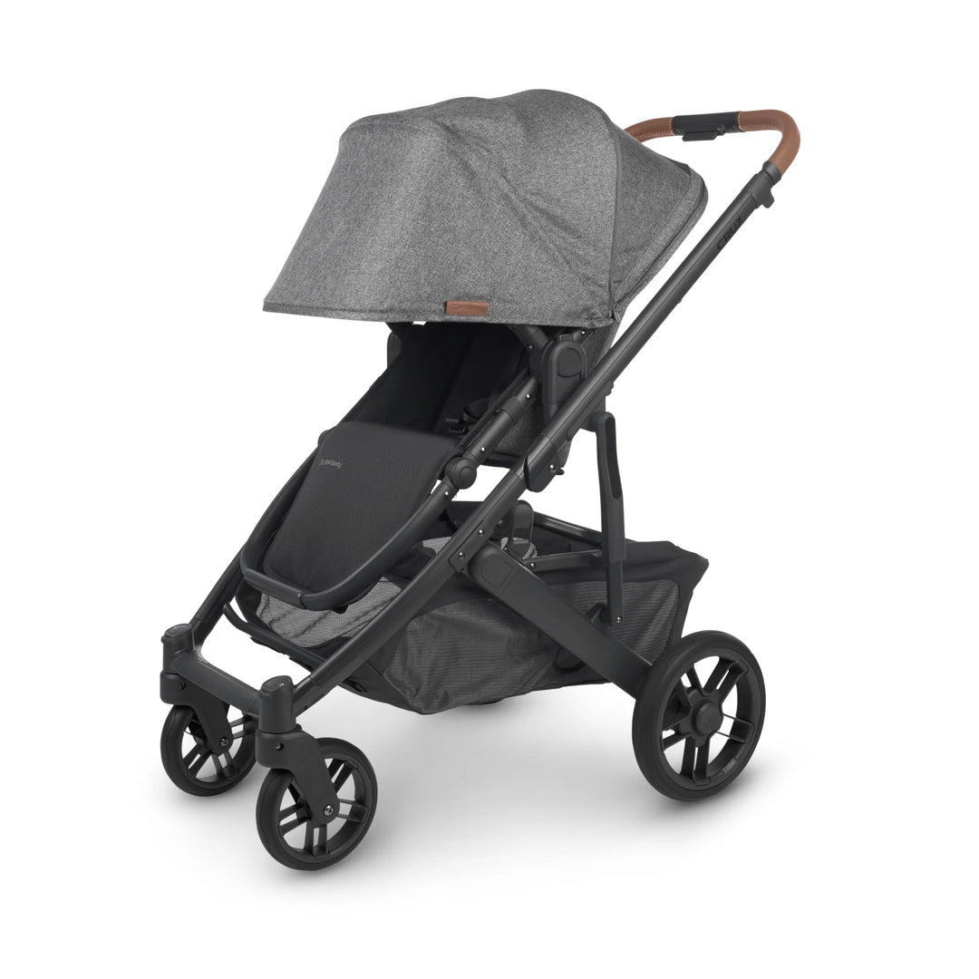 UPPAbaby Cruz V2 Greyson stroller with extended canopy – stylish grey pushchair featuring leather handlebar, reversible toddler seat, and large storage basket for everyday family adventures.