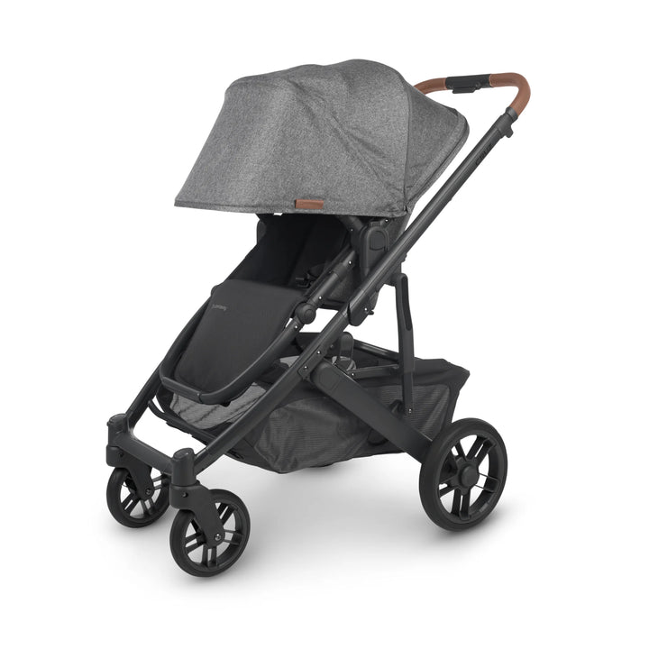 UPPAbaby Cruz V2 Greyson stroller with extended canopy – stylish grey pushchair featuring leather handlebar, reversible toddler seat, and large storage basket for everyday family adventures.