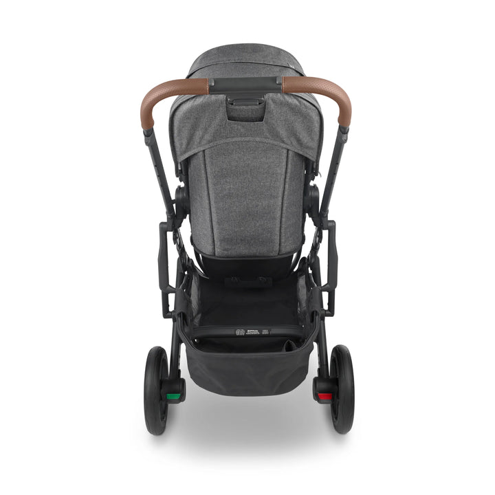 Rear view of UPPAbaby Cruz V2 Greyson stroller – sleek grey pushchair with adjustable leather handlebar, ergonomic design, and large under-seat storage basket for practical everyday use.