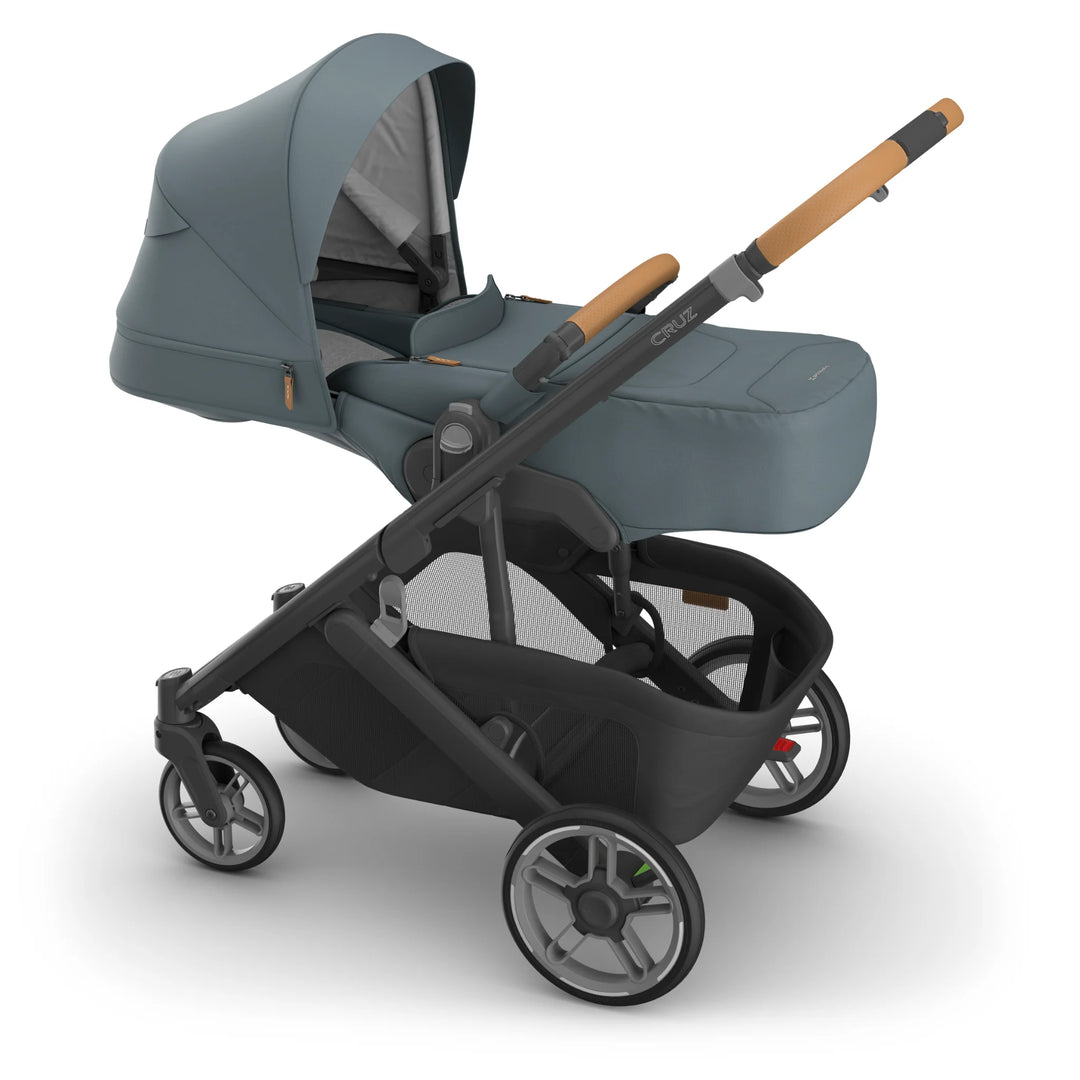 UPPAbaby Cruz V3 with newborn cover attached in Dillan.