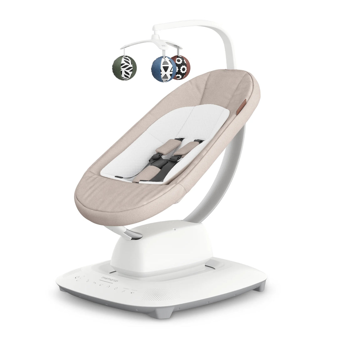 UPPAbaby MamaRoo smart swing in Charlie (beige) with white base and toy mobile, baby soothing seat.