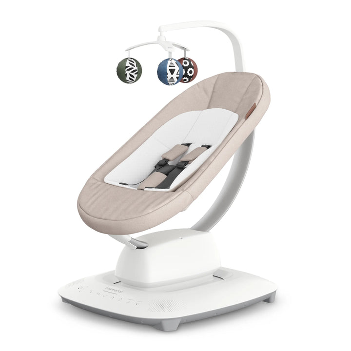 UPPAbaby MamaRoo smart swing in Charlie (beige) with white base and toy mobile, baby soothing seat.