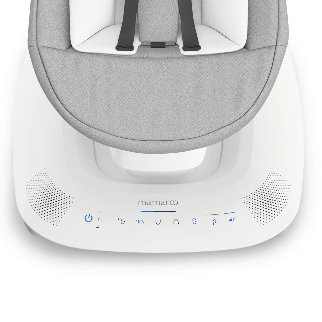 UPPAbaby MamaRoo smart swing Stella close-up of base controls and speaker grille with “mamaRoo” branding.