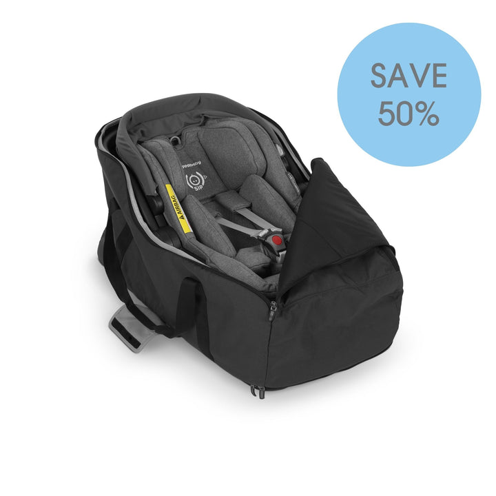 UPPAbaby Mesa i-Size infant car seat placed inside a protective travel bag, featuring padded interior support and a promotional “Save 50%” offer badge on a clean white background.