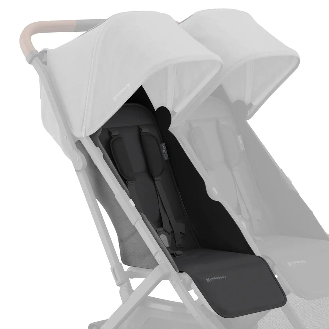 UPPAbaby Minu Duo stroller with grey (Greyson) replacement seat fabric installed on the left seat, with the opposite seat faded on a white background.
