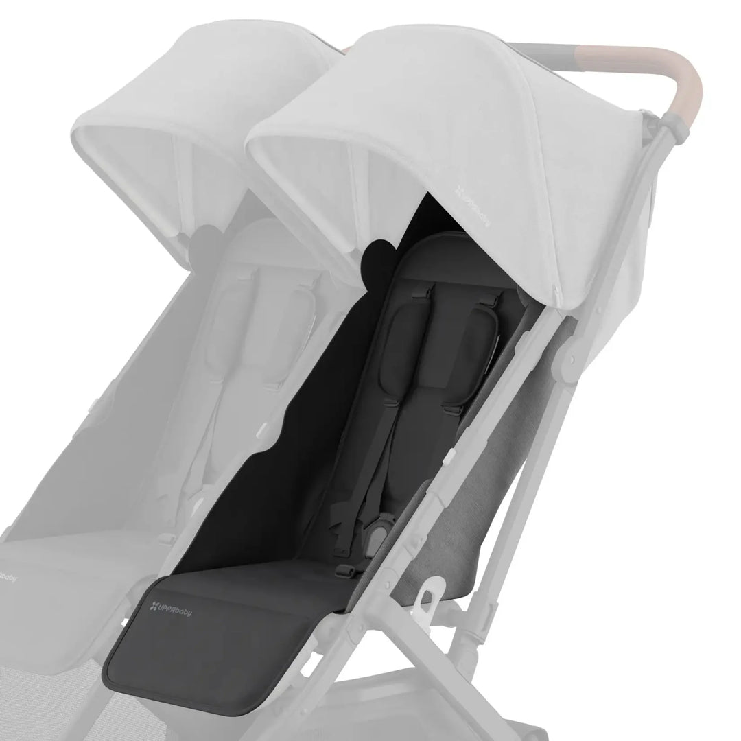 UPPAbaby Minu Duo stroller with grey (Greyson) replacement seat fabric installed on the right seat, with the opposite seat faded on a white background.