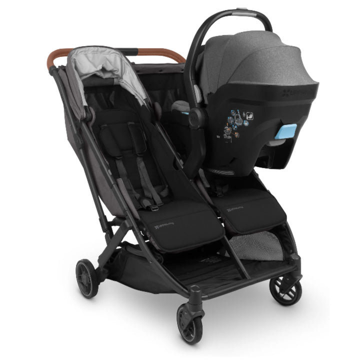 UPPAbaby MINU Duo stroller with MESA infant car seat attached using car seat adapters, angled view on white background