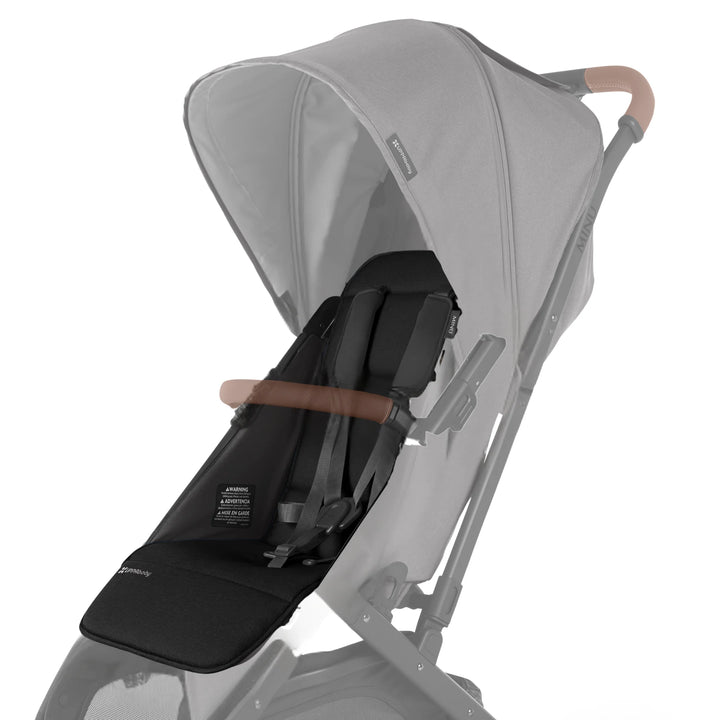 UPPAbaby Minu V2 replacement seat fabric in Greyson (gray) attached to stroller frame on white background